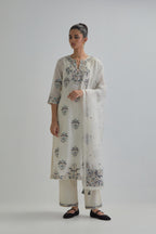 Off White silk Chanderi straight kurta set with all-over floral boota embroidery, highlighted with silver sequins.