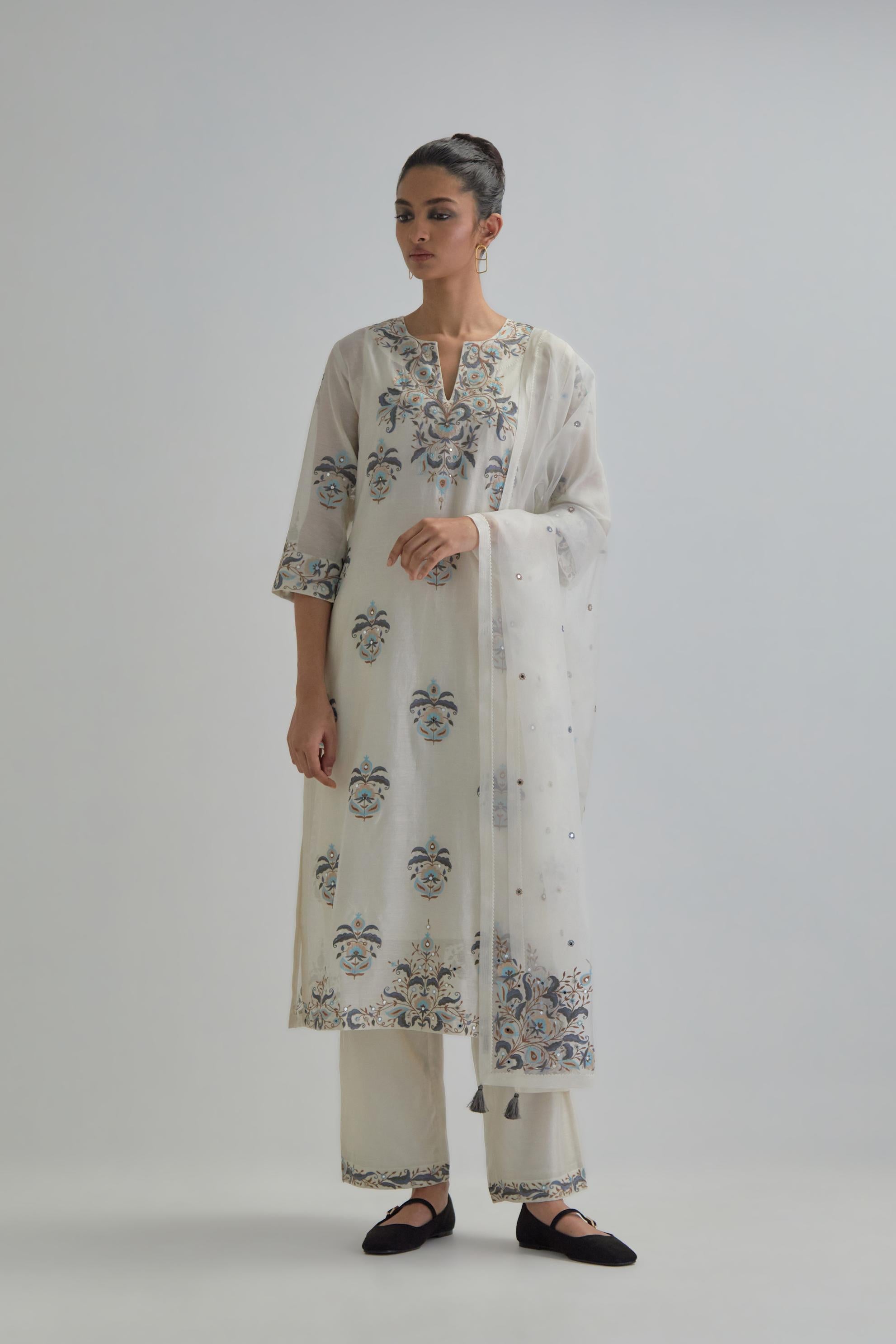Off White silk Chanderi straight kurta set with all-over floral boota embroidery, highlighted with silver sequins.