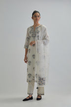 Off White silk Chanderi straight kurta set with all-over floral boota embroidery, highlighted with silver sequins.