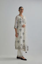 Off White silk Chanderi straight kurta set with all-over floral boota embroidery, highlighted with silver sequins.