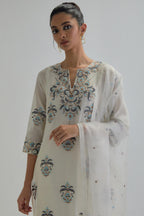 Off White silk organza dupatta with Aari work and earthy coloured flower embroidery all-over the dupatta.