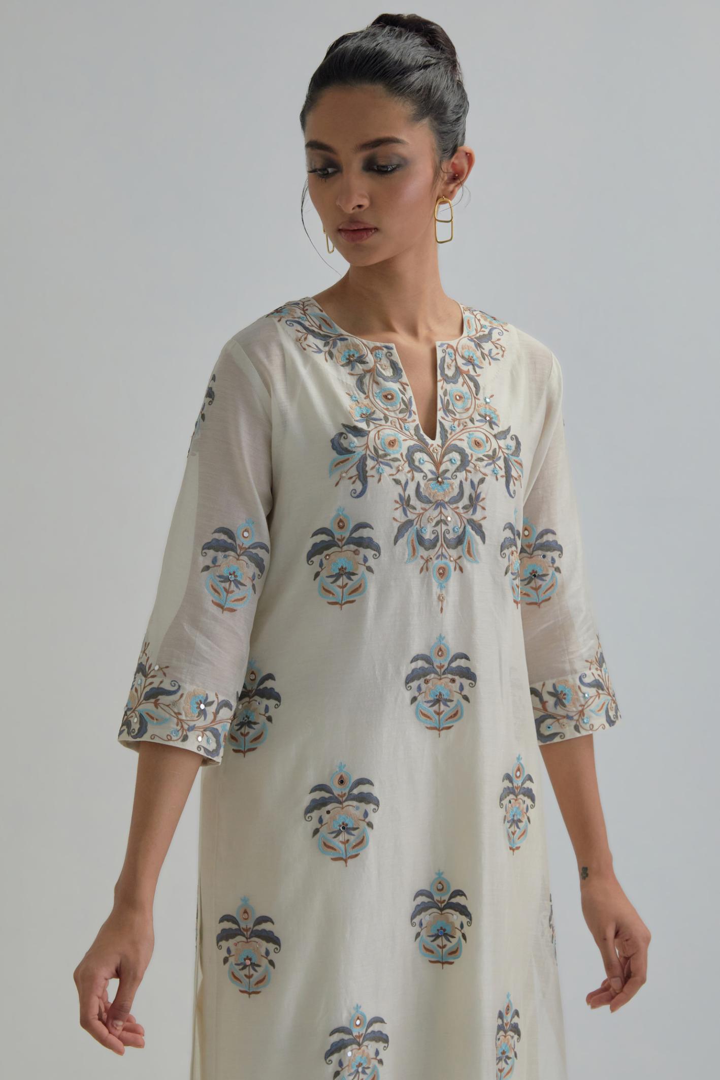 Off White silk Chanderi straight kurta set with all-over floral boota embroidery, highlighted with silver sequins.