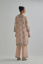 Pink silk Chanderi short kurta set with all-over floral boota embroidery, highlighted with silver sequins.