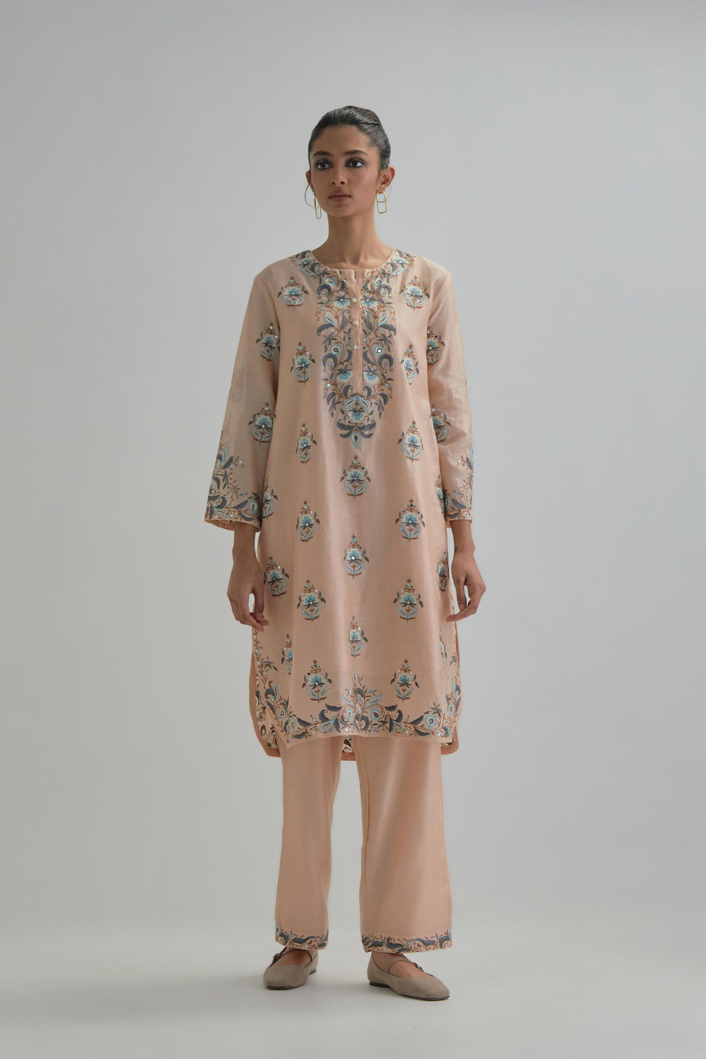 Pink silk Chanderi short kurta set with all-over floral boota embroidery, highlighted with silver sequins.