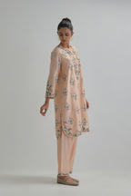 Pink silk Chanderi short kurta set with all-over floral boota embroidery, highlighted with silver sequins.