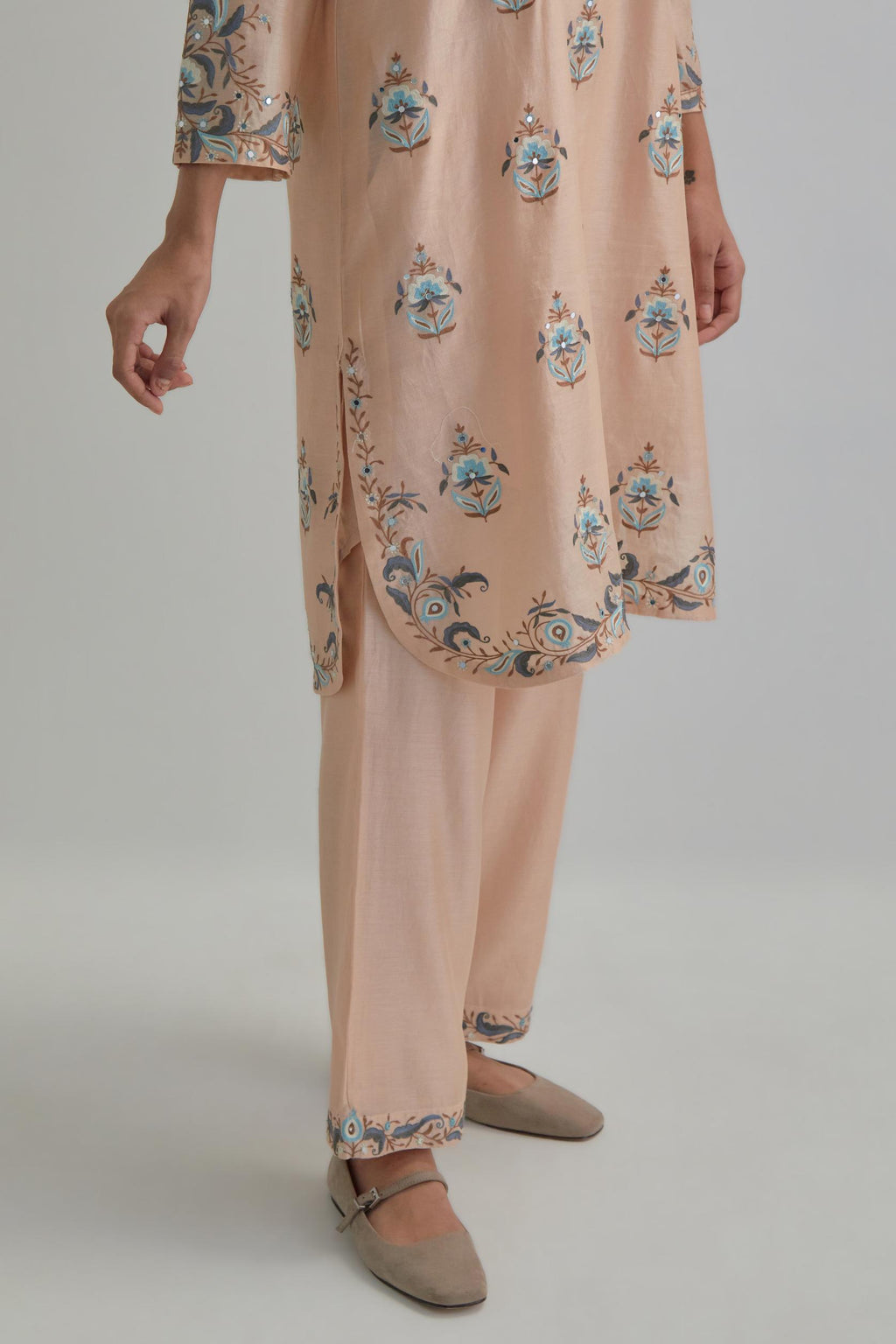 Pink silk Chanderi short kurta set with all-over floral boota embroidery, highlighted with silver sequins.