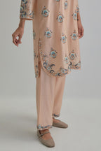Pink silk Chanderi short kurta set with all-over floral boota embroidery, highlighted with silver sequins.