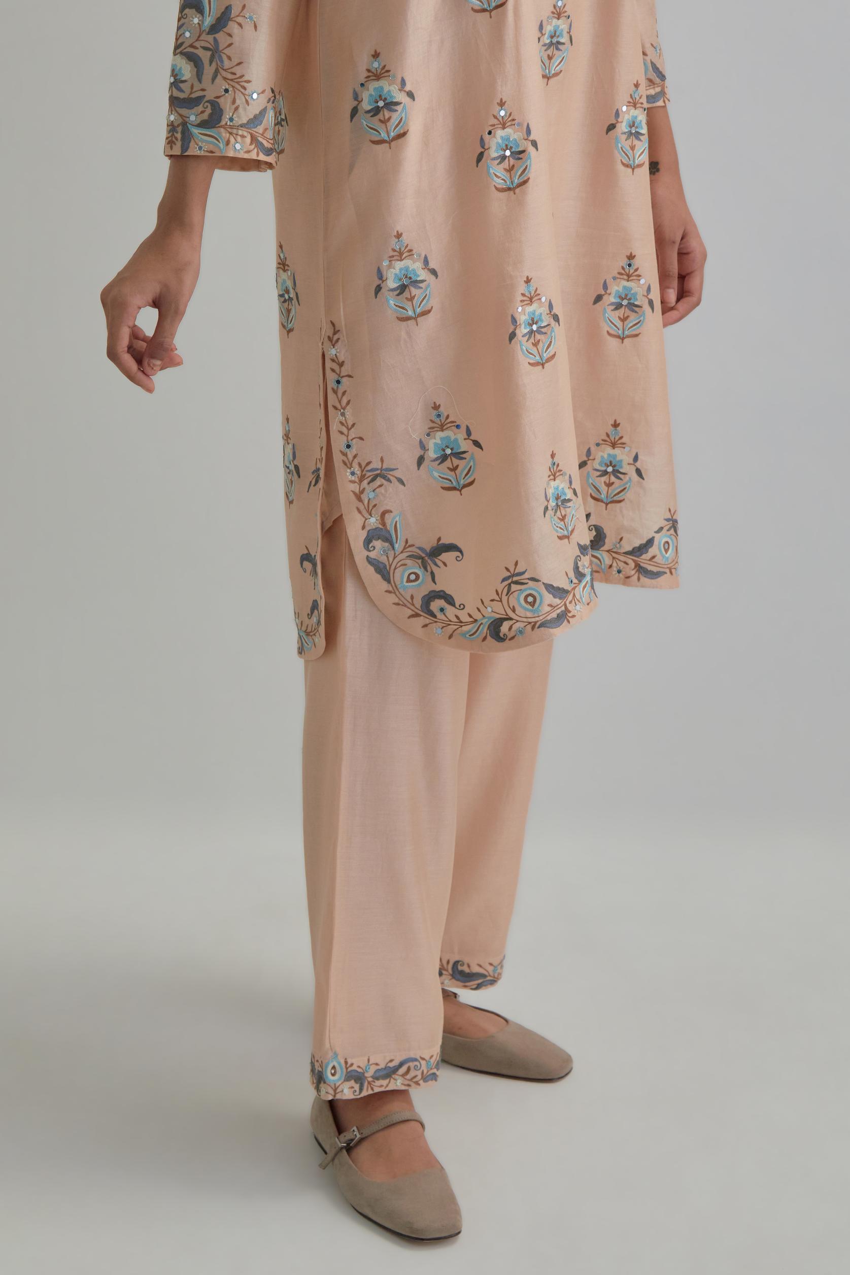 Pink silk Chanderi short kurta set with all-over floral boota embroidery, highlighted with silver sequins.