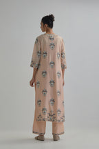 Pink silk Chanderi straight kurta set with all-over floral boota embroidery, highlighted with silver sequins.