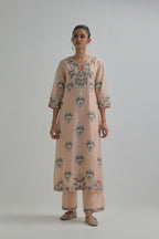Pink silk Chanderi straight kurta set with all-over floral boota embroidery, highlighted with silver sequins.