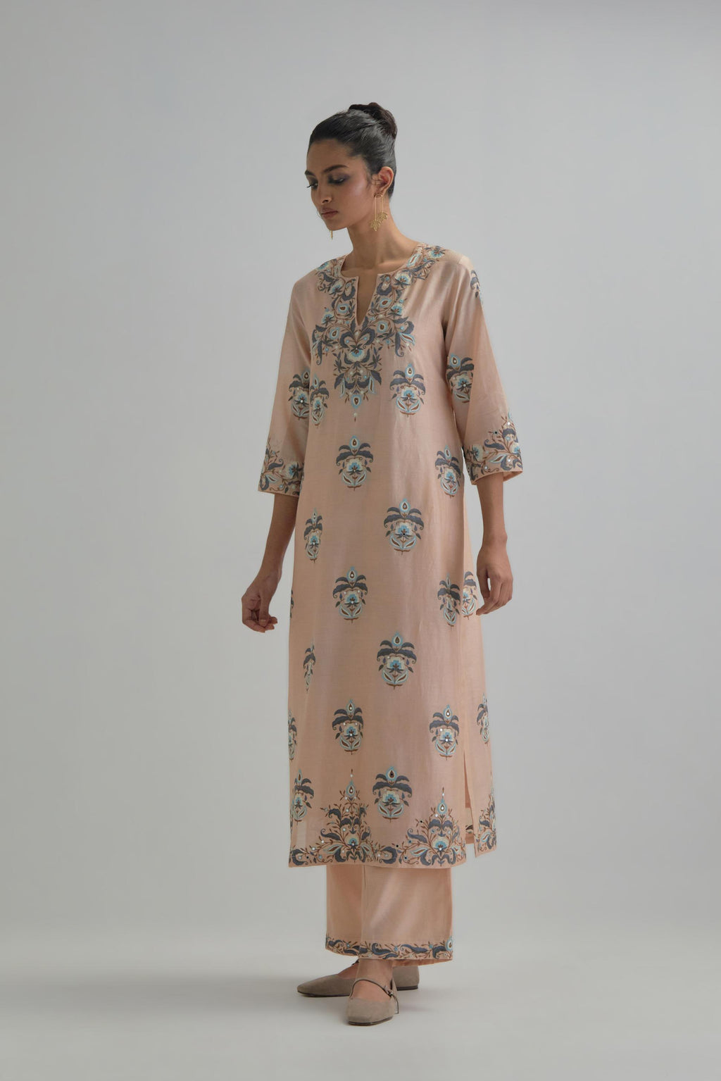 Pink silk Chanderi straight kurta set with all-over floral boota embroidery, highlighted with silver sequins.