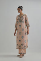Pink silk Chanderi straight kurta set with all-over floral boota embroidery, highlighted with silver sequins.