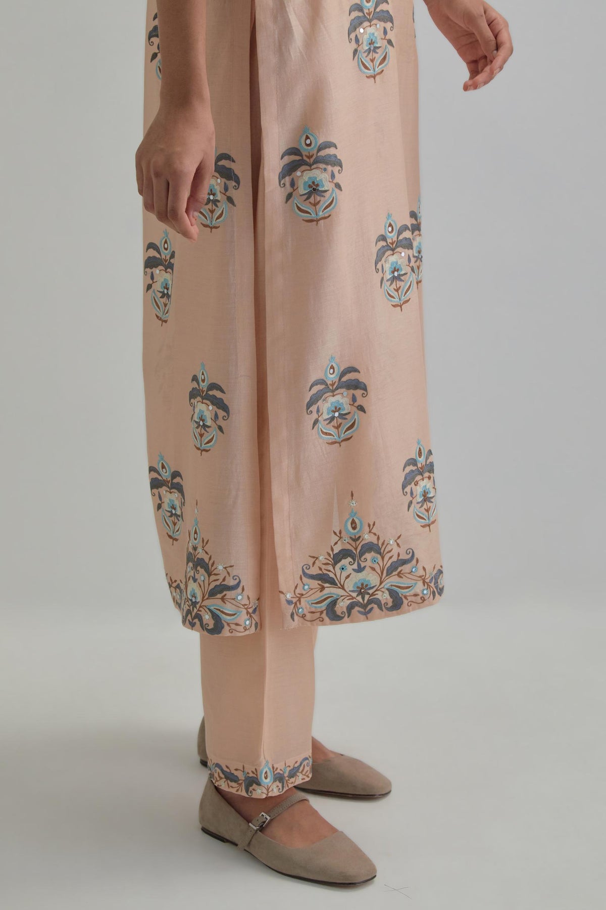 Pink silk Chanderi straight kurta set with all-over floral boota embroidery, highlighted with silver sequins.