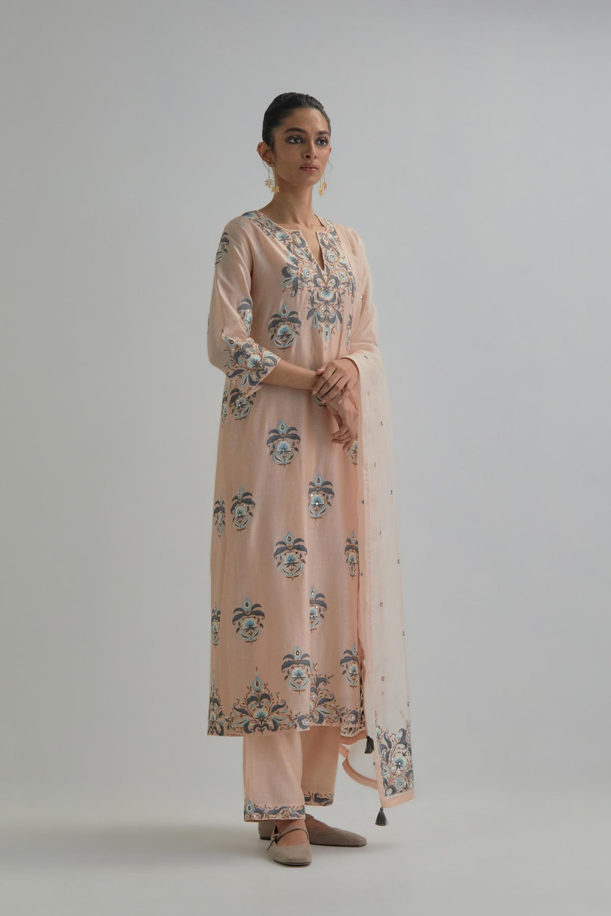 Pink silk Chanderi straight kurta set with all-over floral boota embroidery, highlighted with silver sequins.