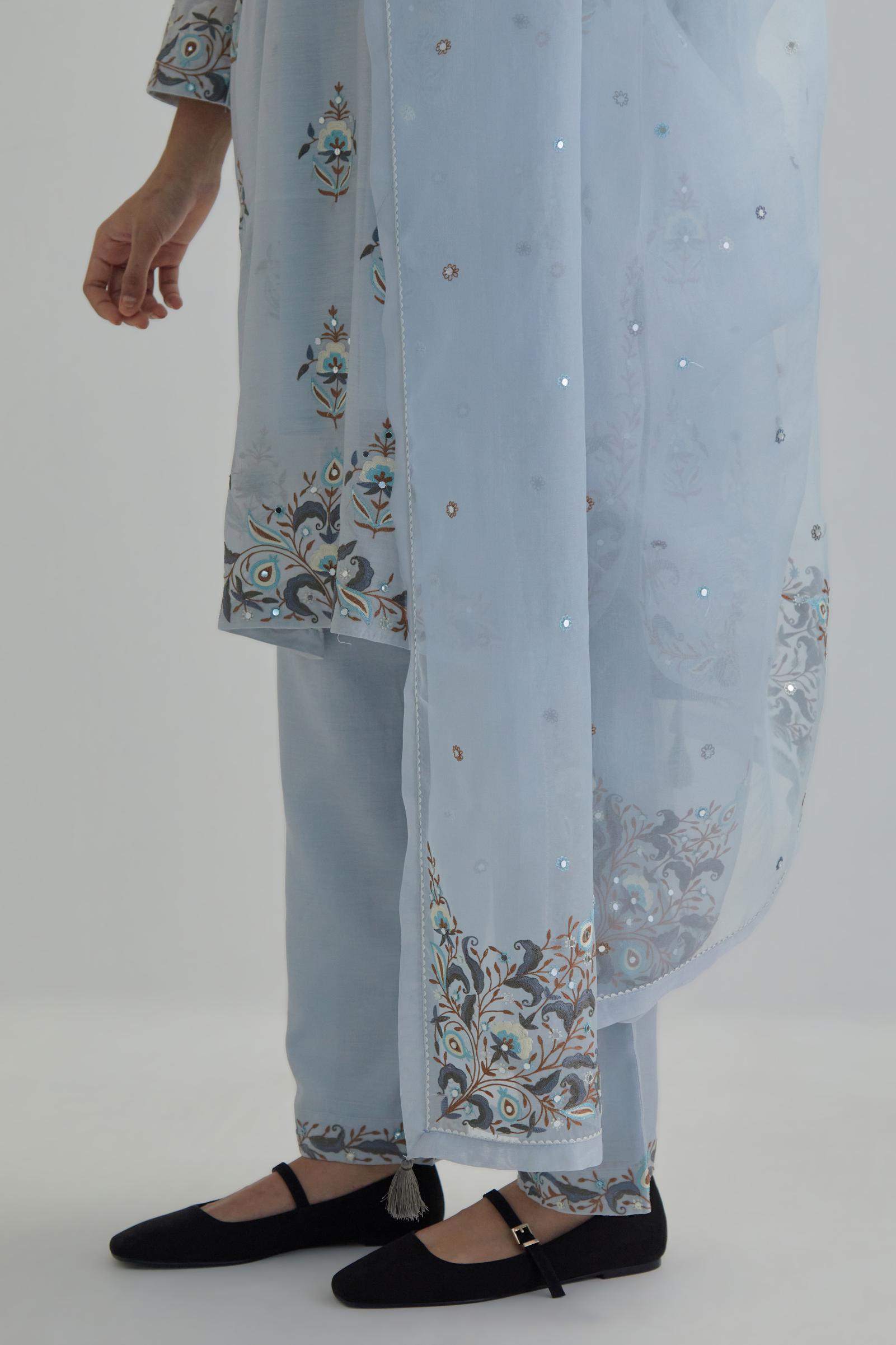 Blue silk organza dupatta with Aari work and earthy coloured flower embroidery all-over the dupatta.
