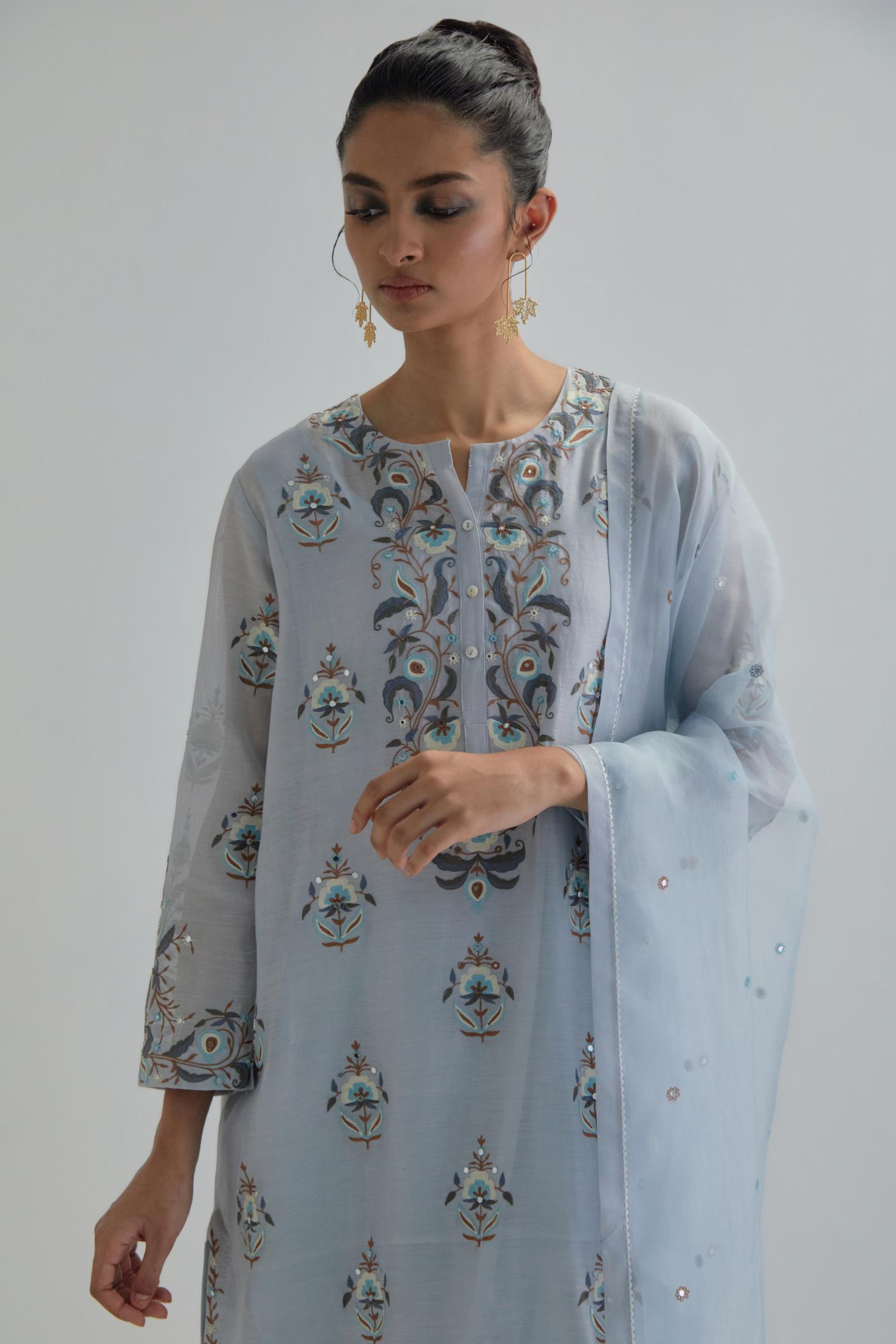 Blue silk organza dupatta with Aari work and earthy coloured flower embroidery all-over the dupatta.
