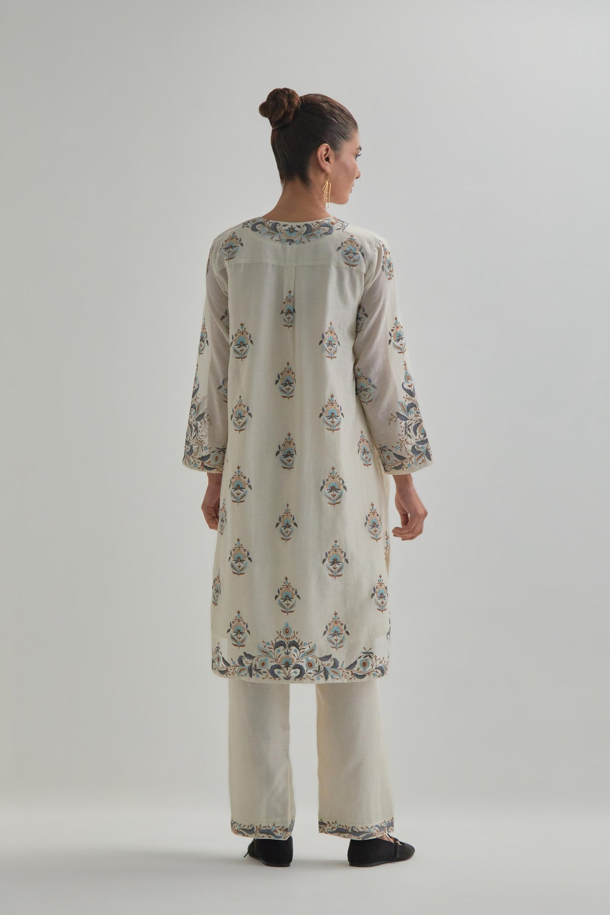 Off White silk Chanderi short kurta set with all-over floral boota embroidery, highlighted with silver sequins.