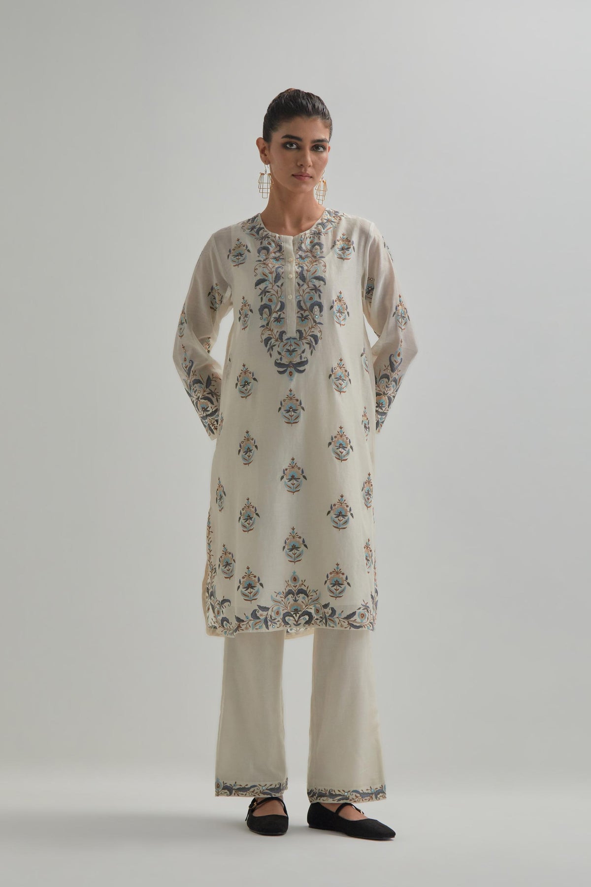 Off White silk Chanderi short kurta set with all-over floral boota embroidery, highlighted with silver sequins.