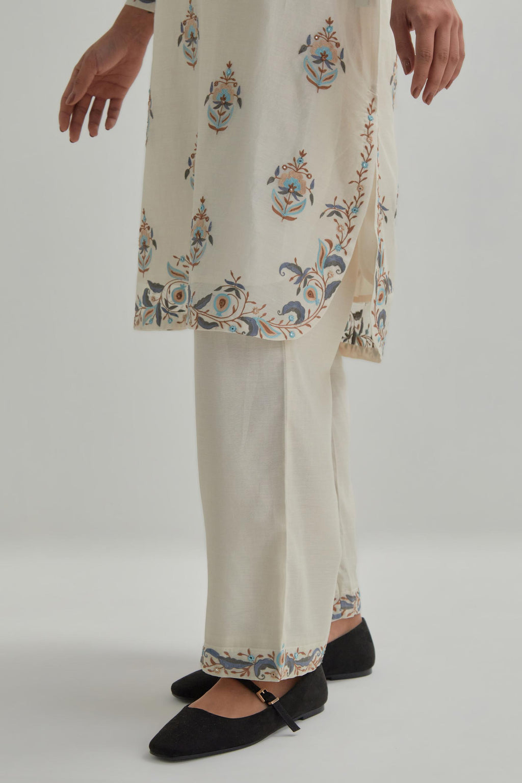 Off White silk Chanderi short kurta set with all-over floral boota embroidery, highlighted with silver sequins.