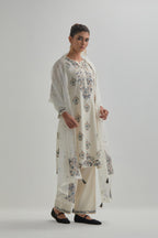 Off White silk Chanderi short kurta set with all-over floral boota embroidery, highlighted with silver sequins.
