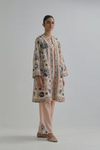 Pink short front open A-line jacket, fully embroidered with bold appliqué flowers, earthy-coloured Aari thread work and silk tassels, paired with Pink silk Chanderi straight pants with earthy coloured appliqué at hem.