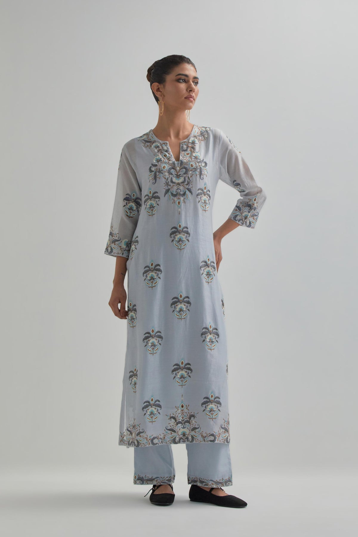 Blue silk Chanderi straight kurta set with all-over floral boota embroidery, highlighted with silver sequins.
