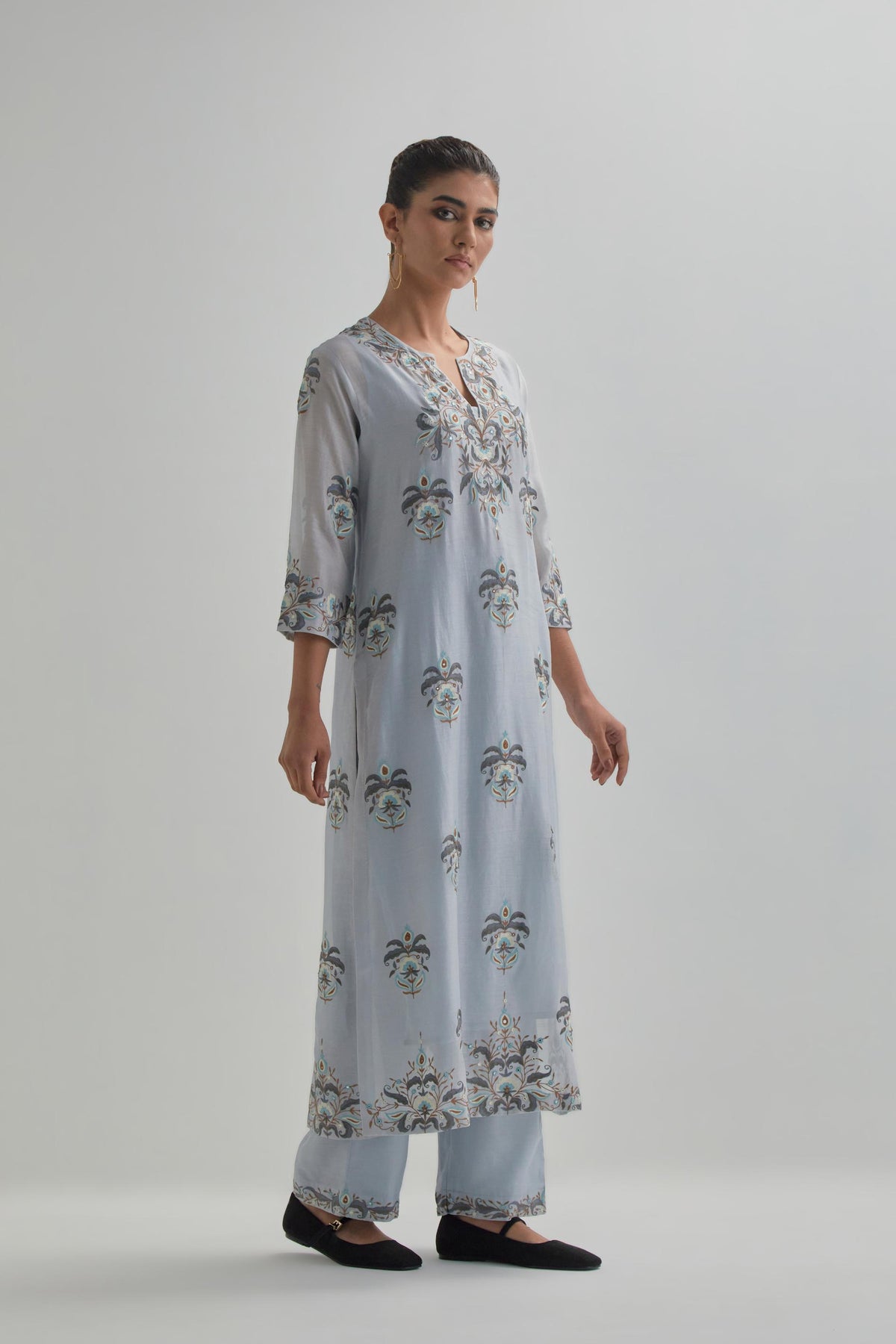 Blue silk Chanderi straight kurta set with all-over floral boota embroidery, highlighted with silver sequins.