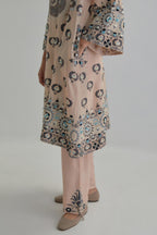 Pink silk Chanderi straight hem mid-length abha style kurta set with bold appliqué embroidery along with earthy-coloured Aari thread work and tassels.