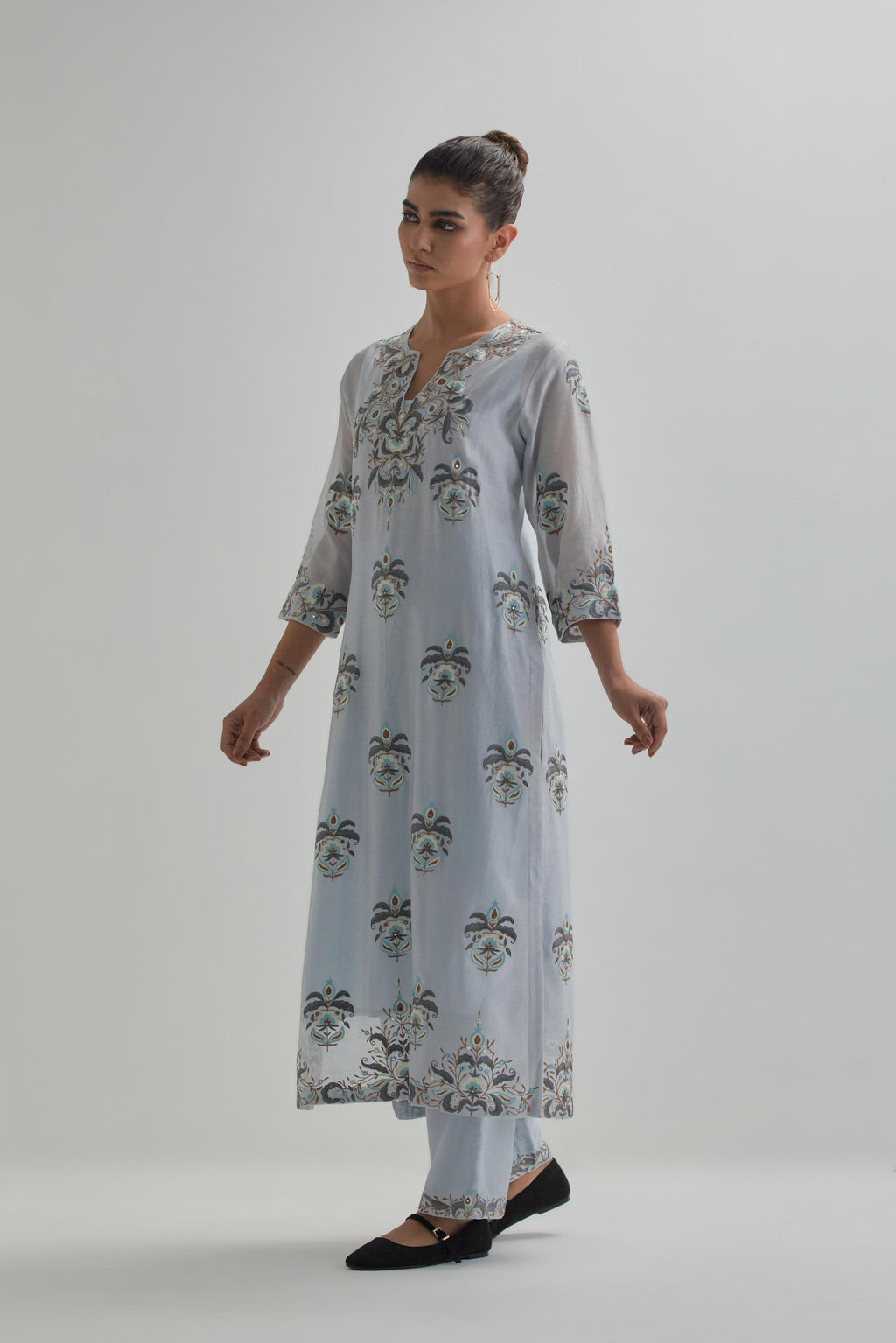 Blue silk Chanderi straight kurta set with all-over floral boota embroidery, highlighted with silver sequins.