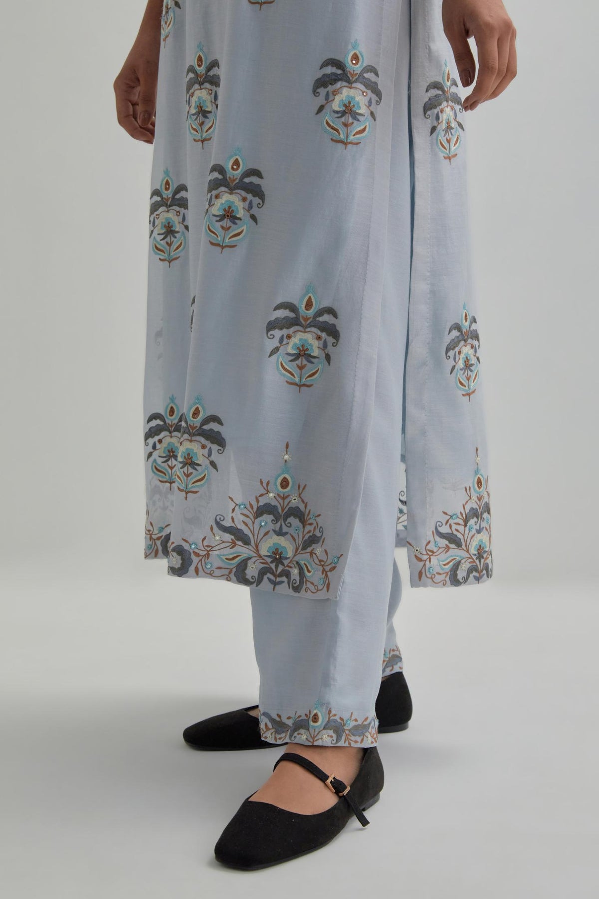Blue silk Chanderi straight kurta set with all-over floral boota embroidery, highlighted with silver sequins.