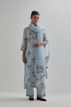 Blue silk Chanderi straight kurta set with all-over floral boota embroidery, highlighted with silver sequins.