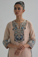 Pink slim fit straight kurta set, decorated with bold appliqué borders all along the side seam, hem and sleeve cuffs.