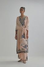 Pink slim fit straight kurta set, decorated with bold appliqué borders all along the side seam, hem and sleeve cuffs.