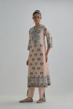Pink straight kurta, fully embroidered with appliqué flowers, earthy-coloured Aari thread work and silk tassels.