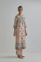 Pink straight kurta, fully embroidered with appliqué flowers, earthy-coloured Aari thread work and silk tassels.