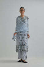 Blue straight kurta, fully embroidered with appliqué flowers, earthy-coloured Aari thread work and silk tassels.