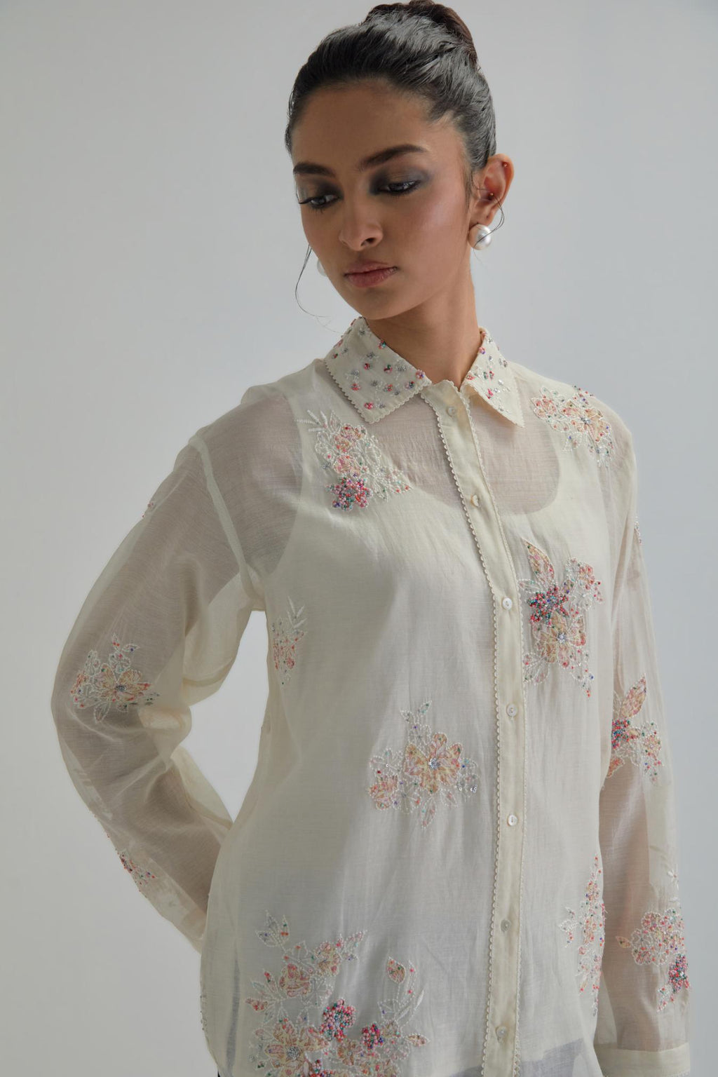 Off white cotton Chanderi embroidered shirt with full sleeves.