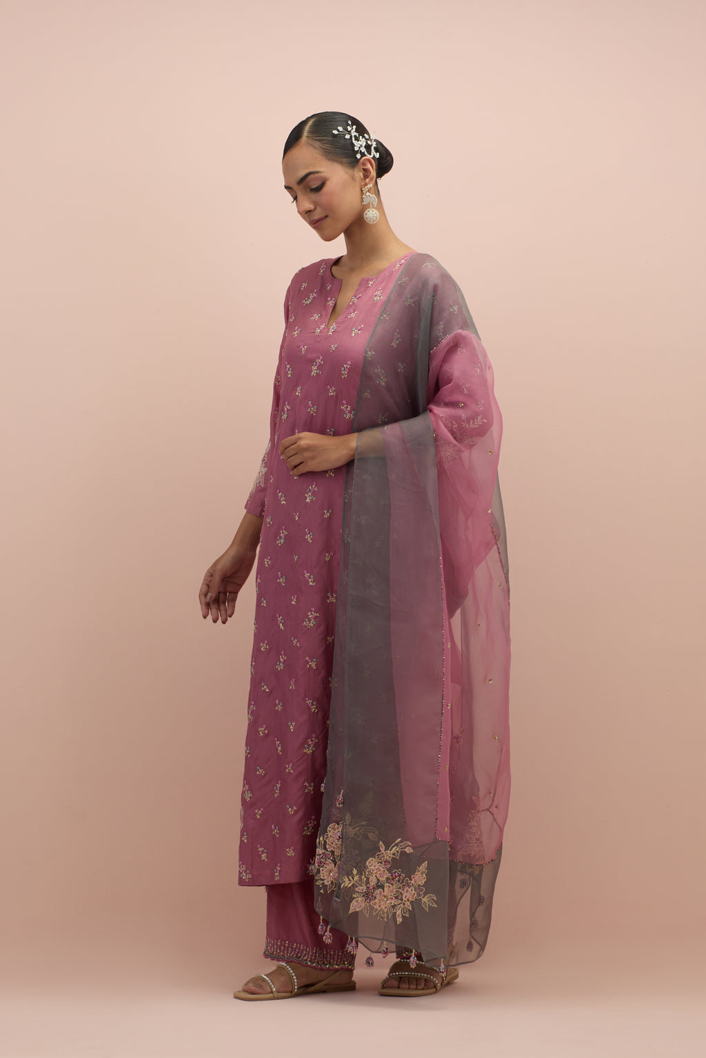 Salmon pink and iron grey silk organza narrow dupatta, highlighted with all-over delicate sequins flower and hand block printed appliqué motifs at dupatta corners.