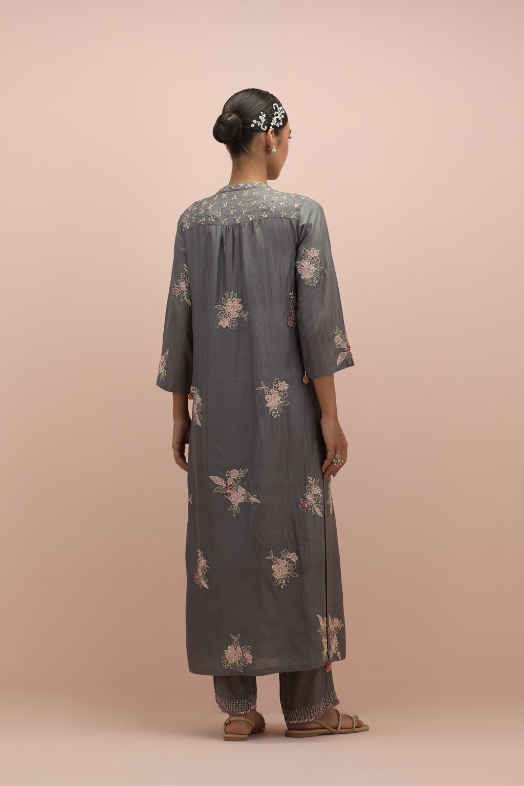 Iron grey straight kurta set with all-over delicate embroidered flowers, highlighted with sequins and multi-colored beads.