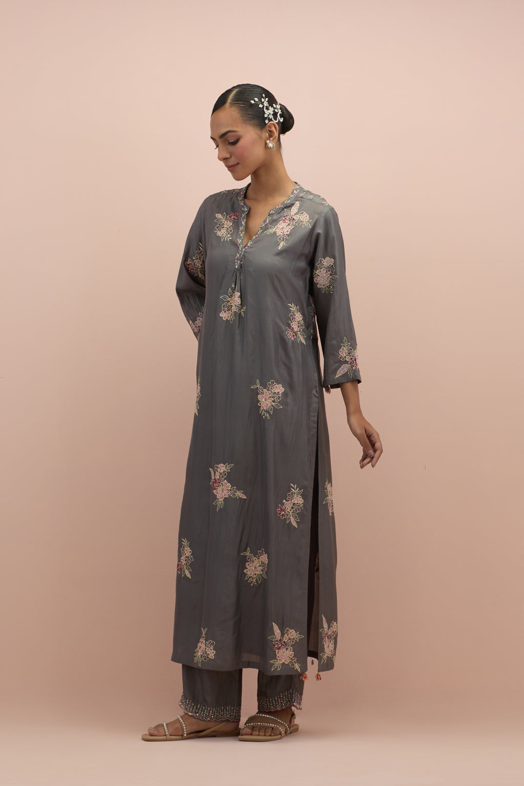 Iron grey straight kurta set with all-over delicate embroidered flowers, highlighted with sequins and multi-colored beads.