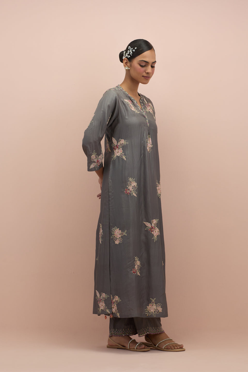 Iron grey straight kurta set with all-over delicate embroidered flowers, highlighted with sequins and multi-colored beads.