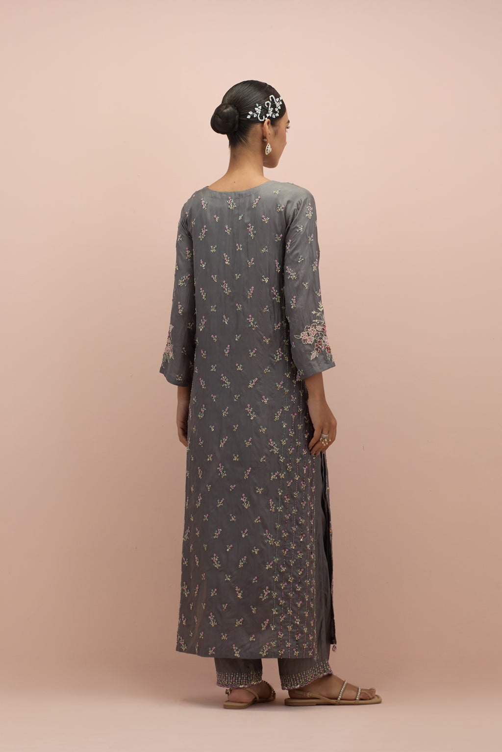 Iron grey straight kurta set with all-over delicate embroidered flowers, highlighted with sequins and multi-colored beads.