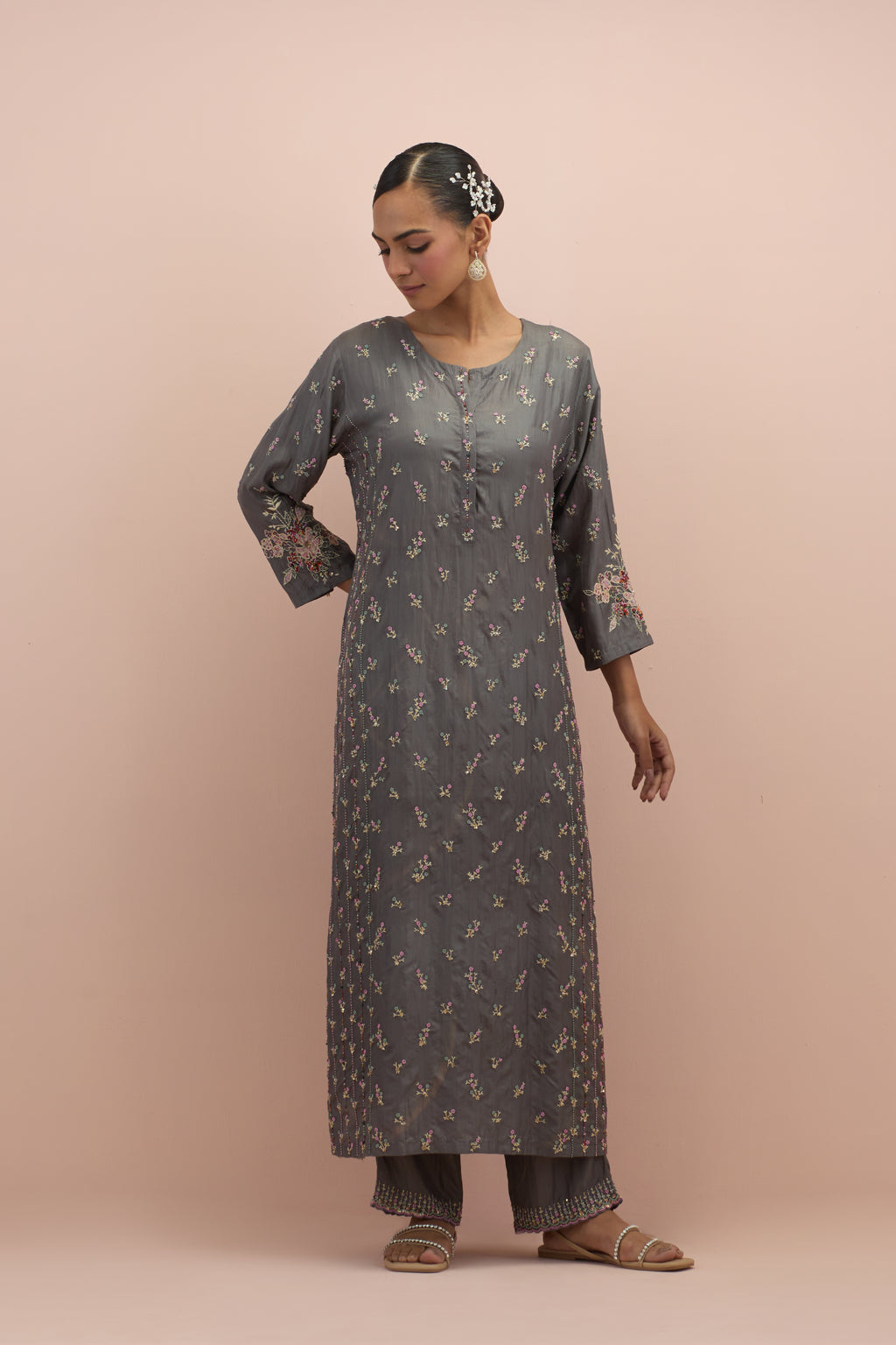 Iron grey straight kurta set with all-over delicate embroidered flowers, highlighted with sequins and multi-colored beads.