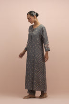 Iron grey straight kurta set with all-over delicate embroidered flowers, highlighted with sequins and multi-colored beads.