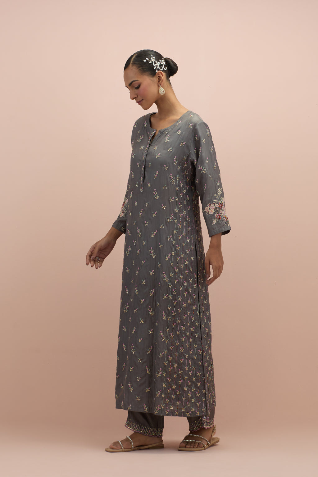 Iron grey straight kurta set with all-over delicate embroidered flowers, highlighted with sequins and multi-colored beads.