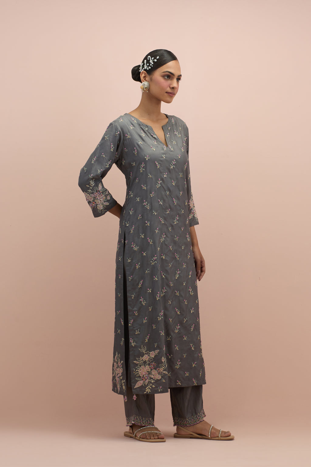 Iron grey silk straight kurta set with all-over delicate embroidered flowers, highlighted with sequins and multi-colored beads.