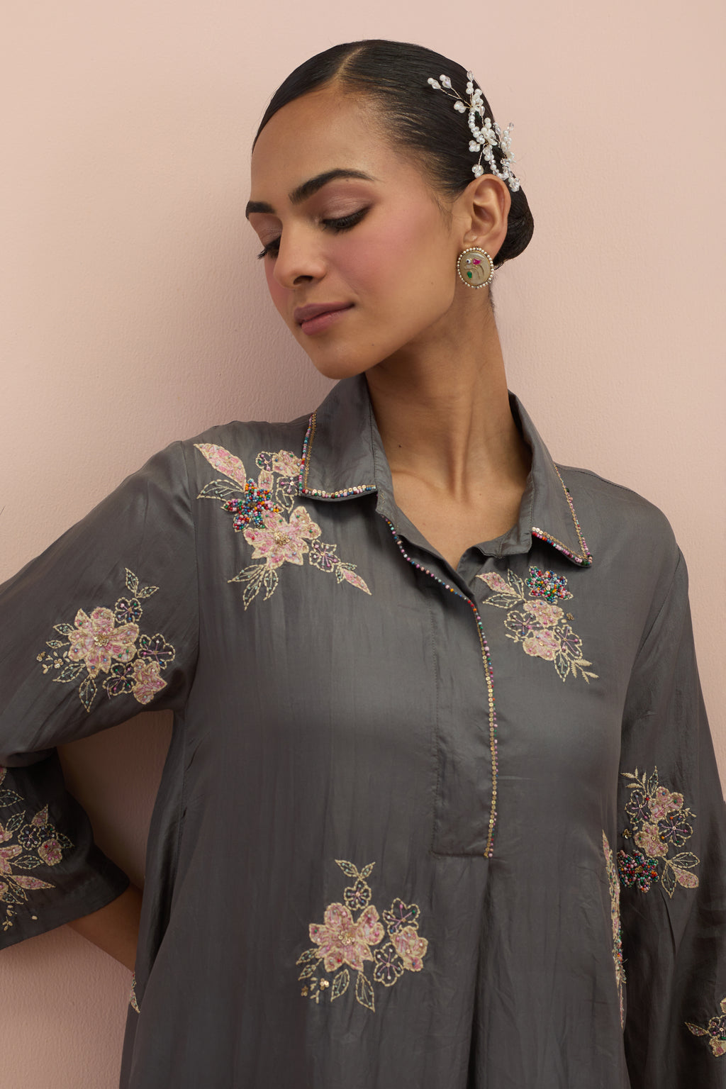 Iron grey silk short shirt-kurta set with all-over appliqué flowers, highlighted with sequins and multi-colored beads.