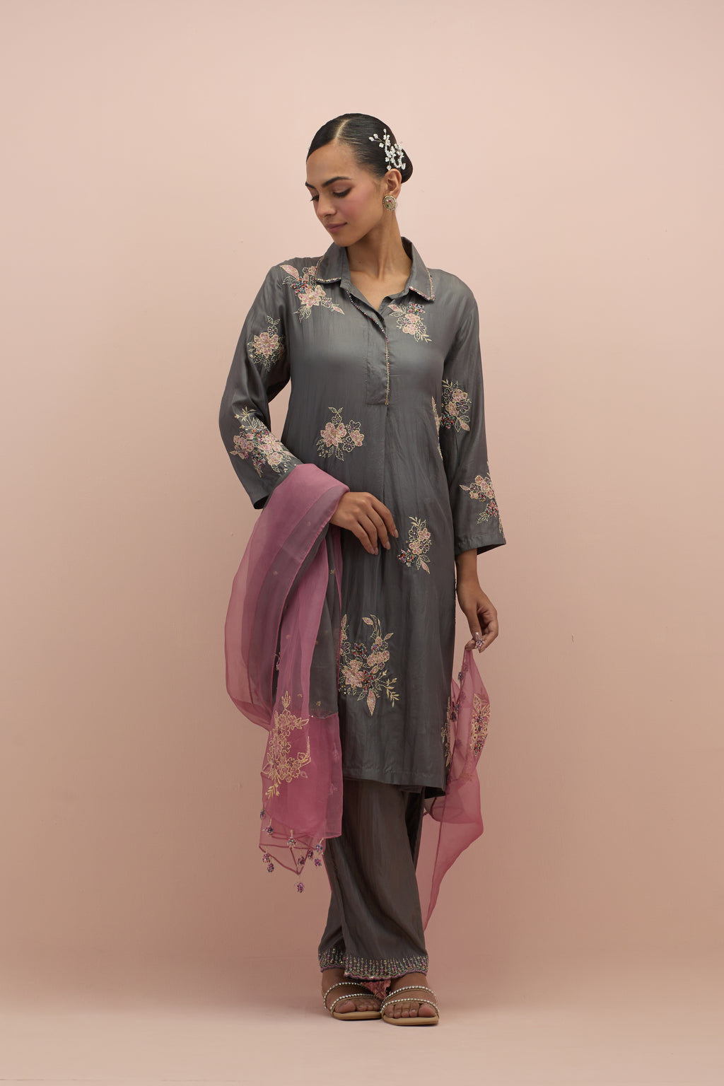 Iron grey silk short shirt-kurta set with all-over appliqué flowers, highlighted with sequins and multi-colored beads.