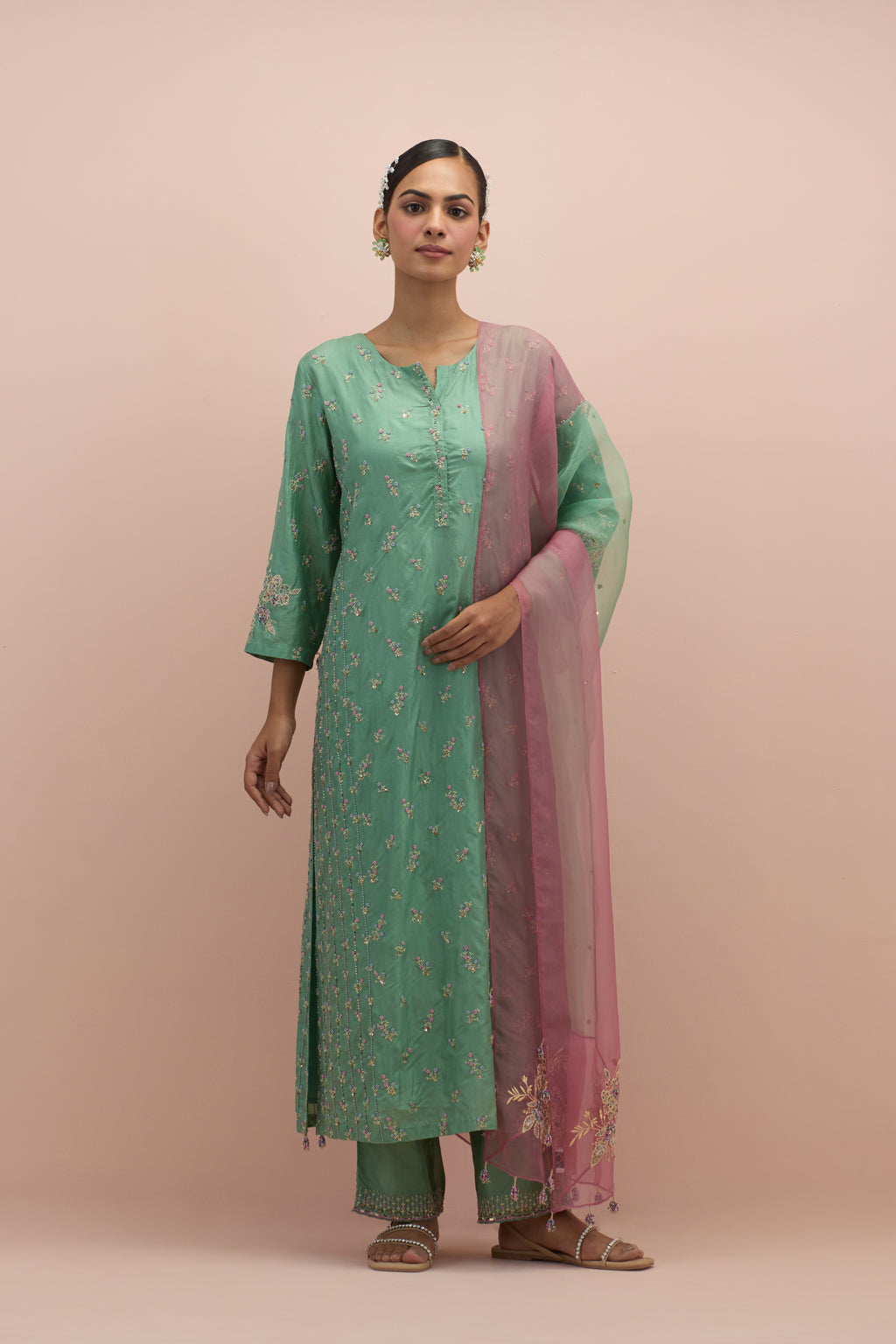 Jade green & salmon pink silk organza narrow dupatta, highlighted with all-over delicate sequins flower and hand block printed appliqué motifs at dupatta corners.