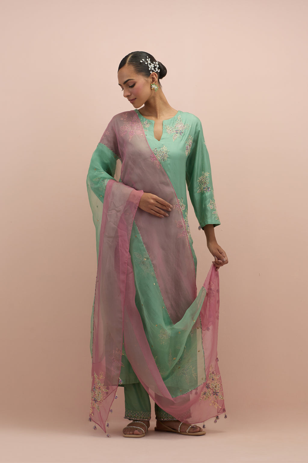 Jade green & salmon pink silk organza narrow dupatta, highlighted with all-over delicate sequins flower and hand block printed appliqué motifs at dupatta corners.